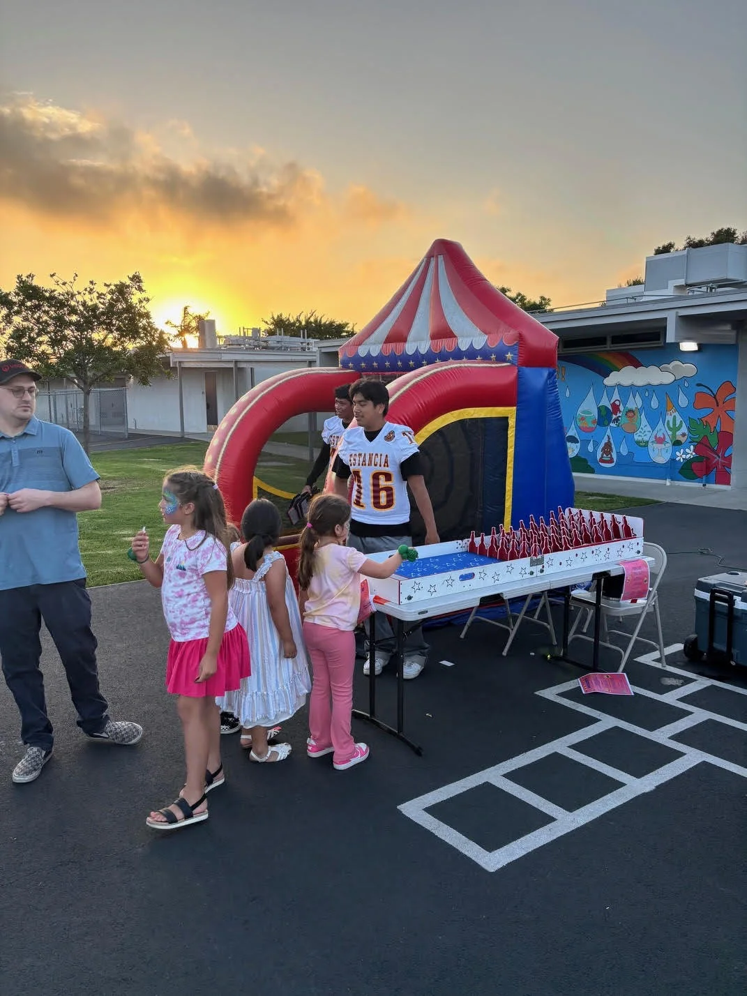 Estancia Footall Players manning the Booth