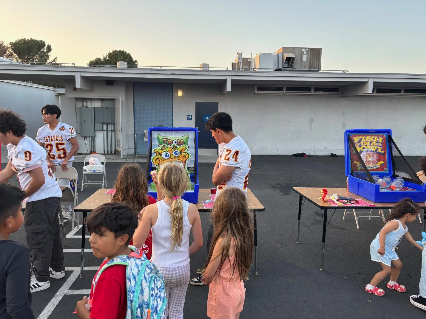 Estancia Footall Working the Adams El Carnival