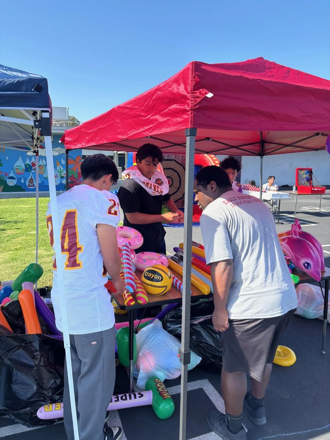 Estancia Footall Players sorting prizes