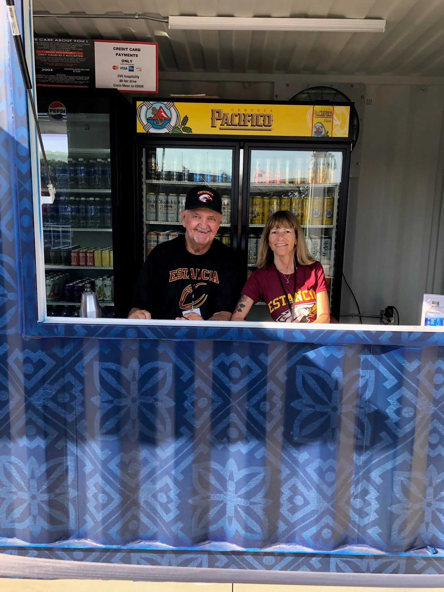 Smiles working the booth