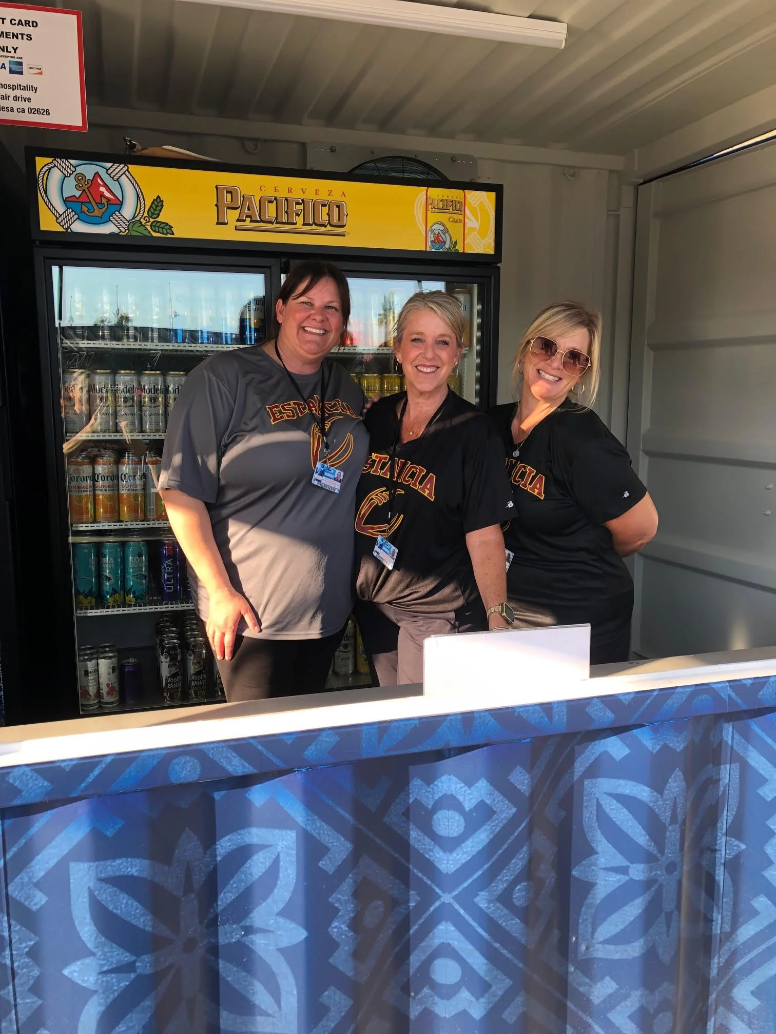 Smiles working the booth