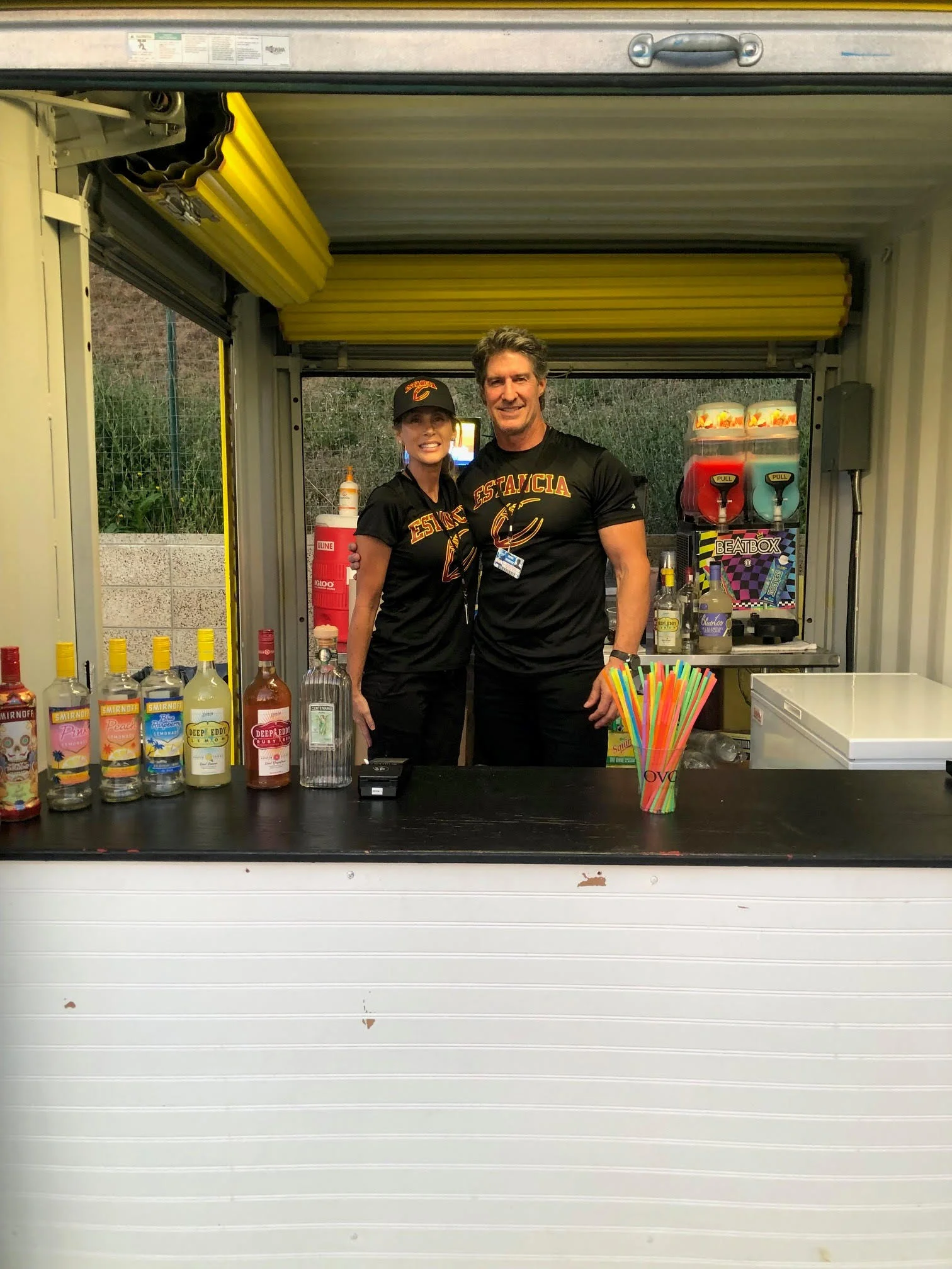 Smiles working the booth